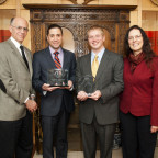 The Lewis & Clark School of Law Negotiation Team, Nathan Morales and Matthew Ring (shown here with Dean Robert Klonoff and their coac...
