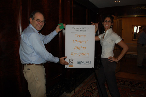 NCVLI staff member Scott Flor and volunteer welcoming guests to the 3rd Annual Crime Victims' Rights Reception