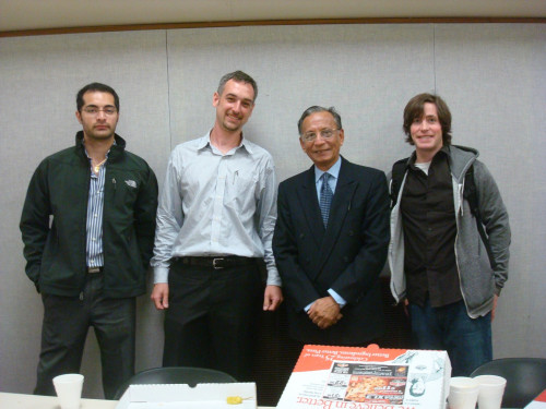 ILS Board members Rohit, Jason, and David pose with Justice Ansari.