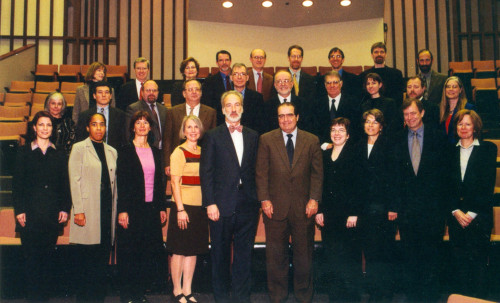 Members of the faculty pose with Associate Justice of the U.S. Supreme Court Antonin Scalia in 2002 during the dedication of Louise and E...