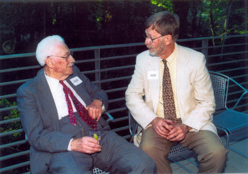 Oregon Supreme Court Justice Ralph Holman '37 and his former court clerk, Judge William C. Snouffer, visit during a 2002 event.