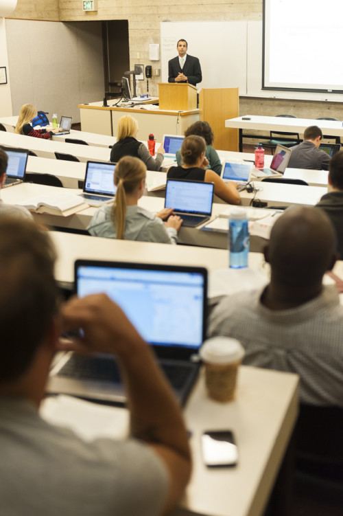 Professor Samir Parikh teaches in classroom 2 in 2013. A laptop has become a necessary tool in law school.