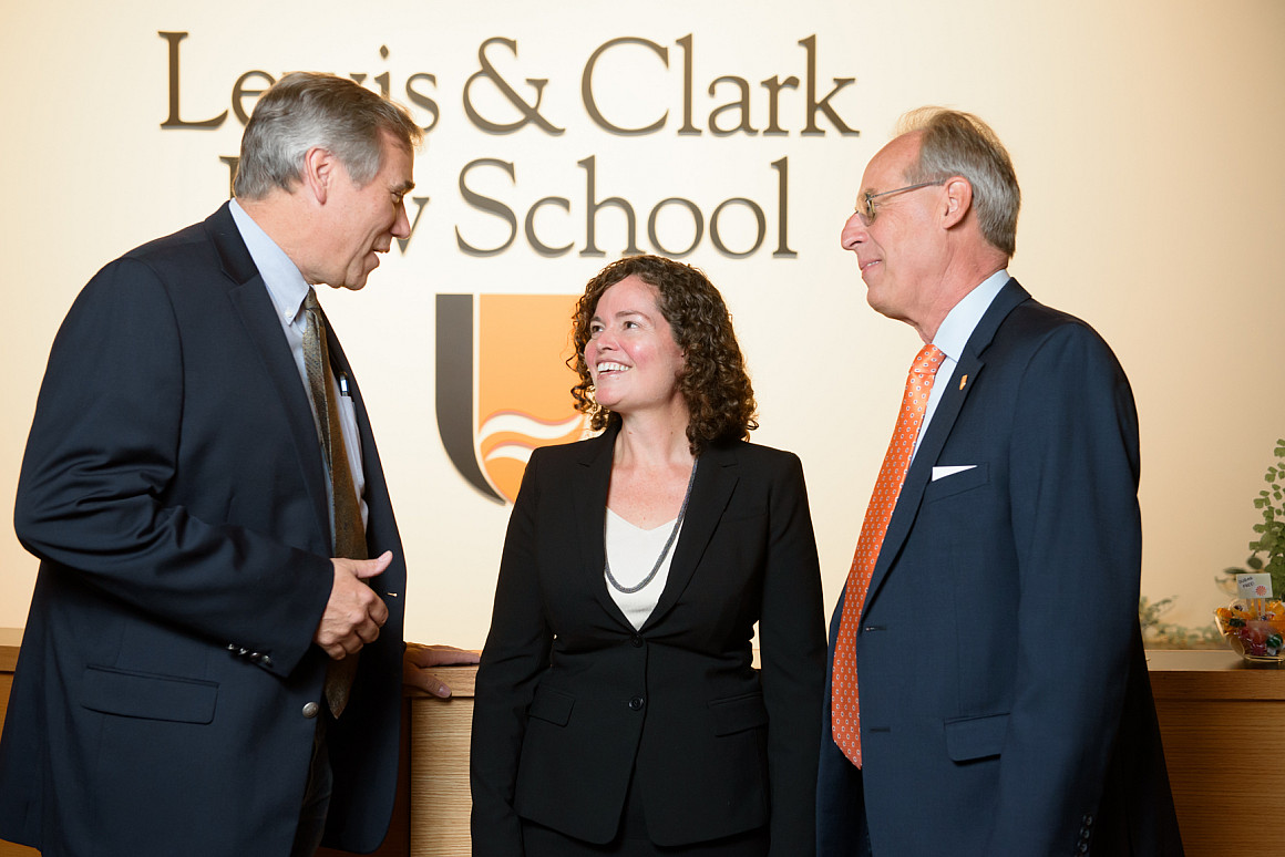 Senator Jeff Merkley (D-OR) speaks with law professor and founder of the Green Energy Institute, Melissa Powers and Lewis & Clark pre...