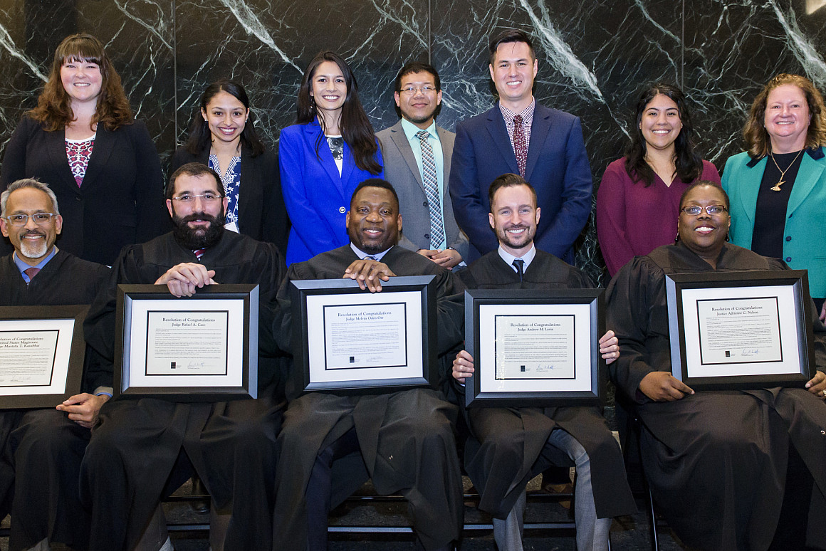 Honored Judges with law student presenters.