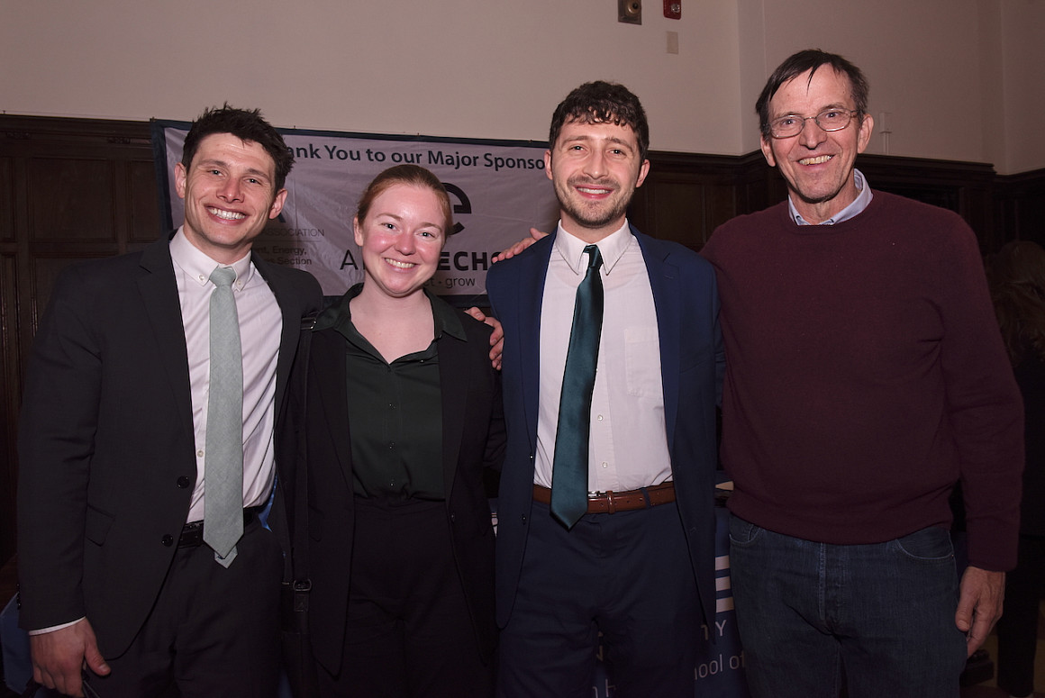 Lane Kadish '25, Sophie Keller '26, and Michael F. Johnson '25 join Professor Craig Johnston in celebratory photo after winning the 2025 ...