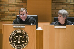 Chief Justice Roberts questioning the moot court competitors