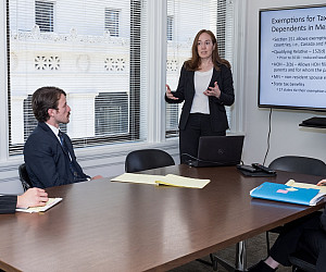 Clinic Director Sarah Lora with Clinic Students