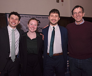 Lane Kadish '25, Sophie Keller '26, and Michael F. Johnson '25 join Professor Craig Johnston in celebratory photo after winning the 2025 ...