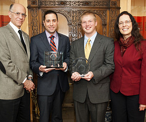 The Lewis & Clark School of Law Negotiation Team, Nathan Morales and Matthew Ring (shown here with Dean Robert Klonoff and their coac...