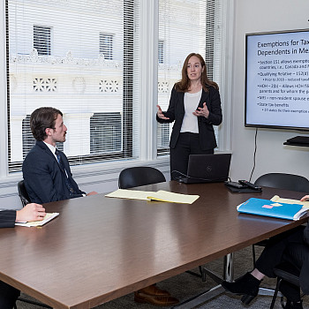 Director Sarah Lora with Clinic Students