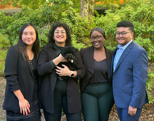 (Left to Right: Tracey Nguyen, Amarit Ubhi (holding Westley McCormack), Victoria Minnieweather, and Jade Miller). Credit: Jacob McCorm...