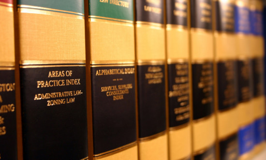 Books on a shelf of a legal library