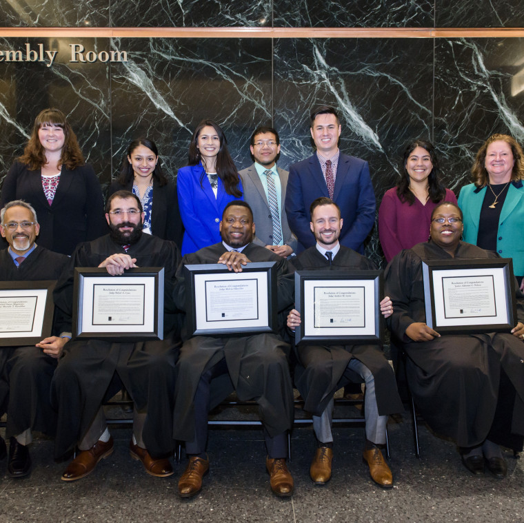 Honored Judges with law student presenters.