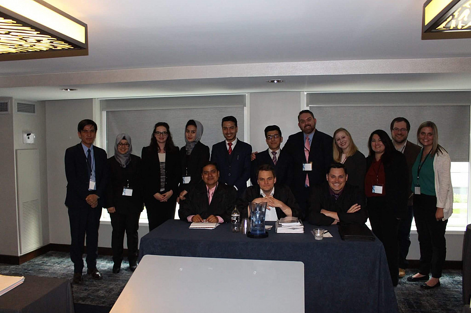 Lewis & Clark's team with judges and the team from Afghanistan