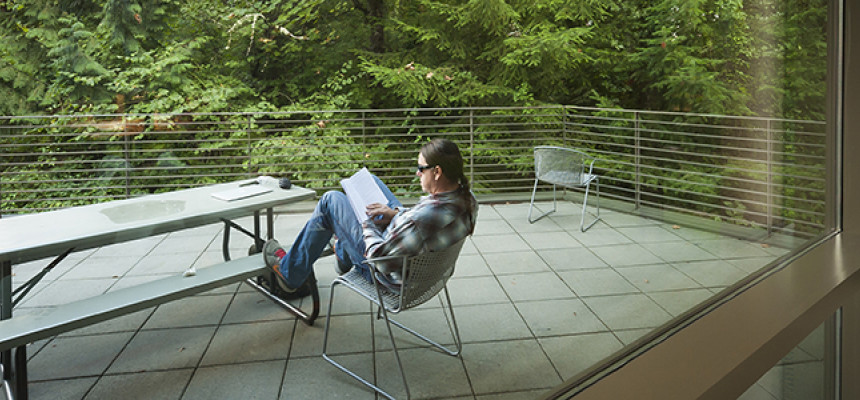 Student studying outside on the Boley patio. There are lots of great study spots on our campus, b...