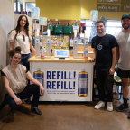 The Wonderfil team with a dispenser station.