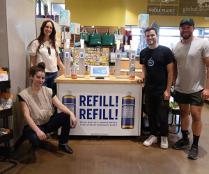 The Wonderfil team with a dispenser station.