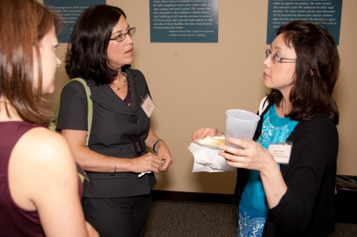 NCVLI Pro Bono Attorney Gina Atwood and NCVLI Vision 21 Project Director Julie Landrum speak with an Open House guest about their experie...