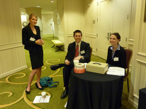 Lewis & Clark law students Taylor Duty, Christian Eickelberg, and Bridgett Shephard help out as volunteers at the Conference. - Photo...