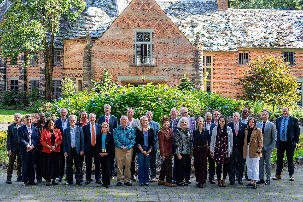 The 2025-2026 Lewis & Clark Board of Trustees was photographed in front of the Frank Manor House in October 2025, the 100th year of t...