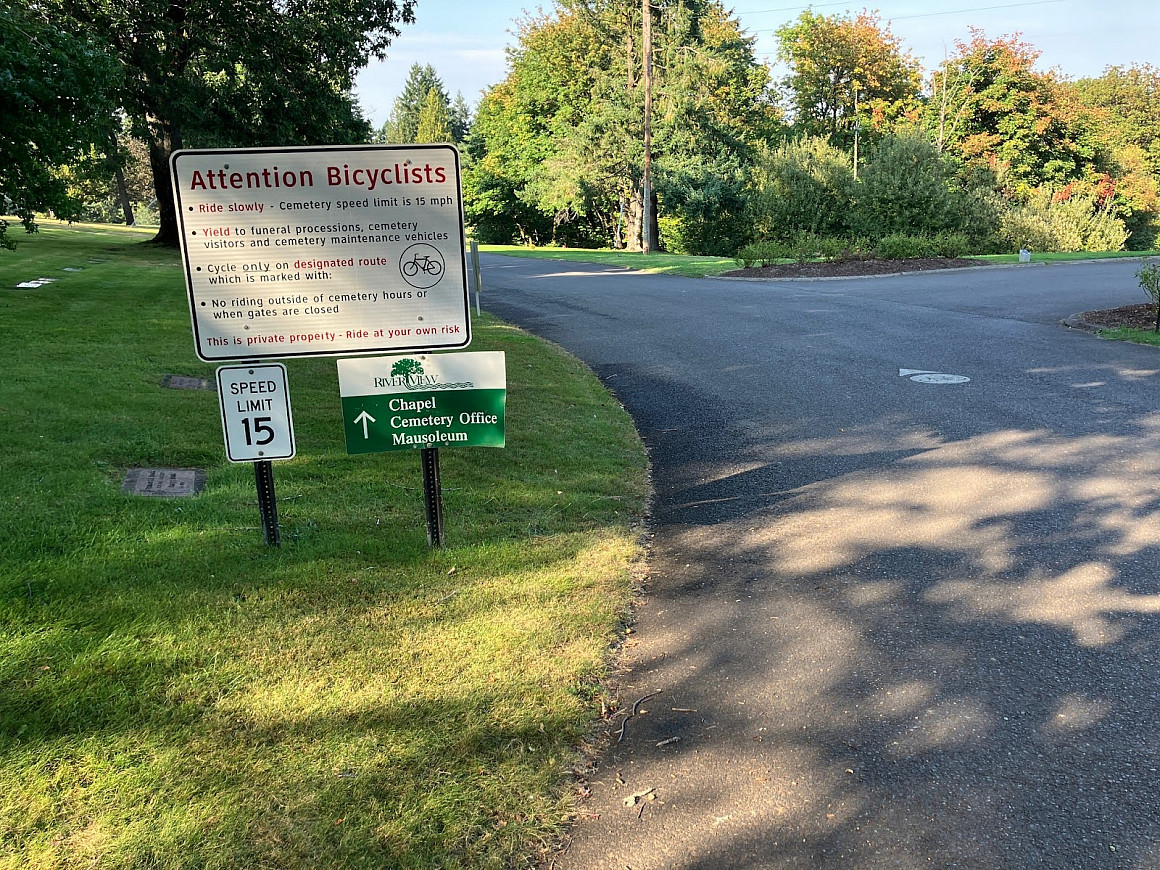 Attention Bicyclists River View Signage
