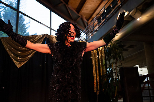 Regina started the night off singing “Get The Party Started by Shirley Bassey.