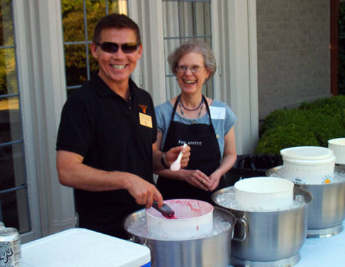 Associate Vice President for Public Affairs and Communications Tom Krattenmaker and Vice President and Provost Jane Atkinson serve ice cream