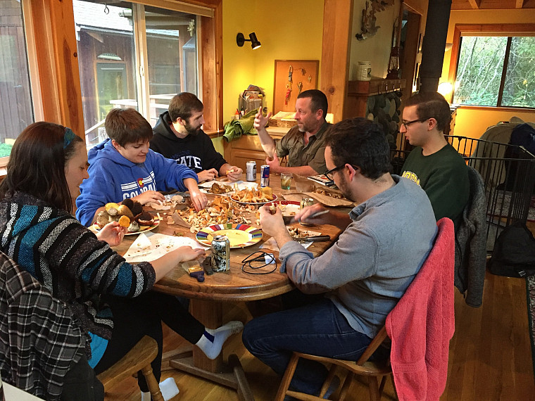 ELC members cleaning freshly picked mushrooms