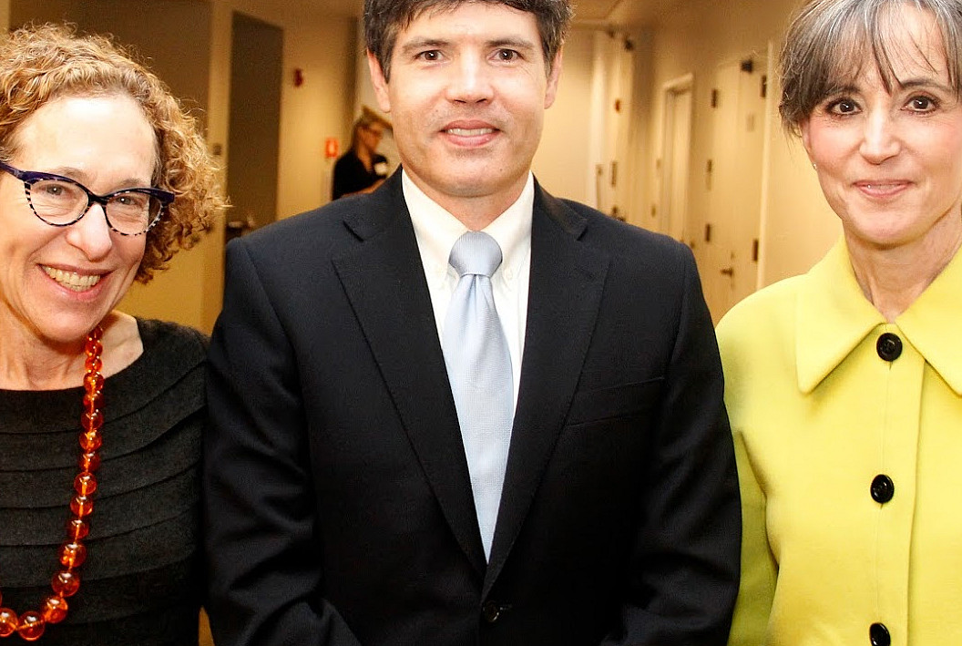 Sponsors Janet Hoffman and Chris Helmer '74 with Professor George Foster.