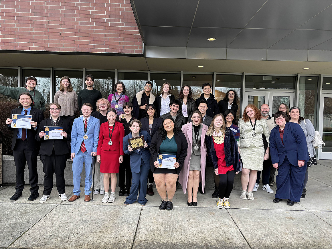 Members of the Lewis & Clark speech/debate team and coaching staff