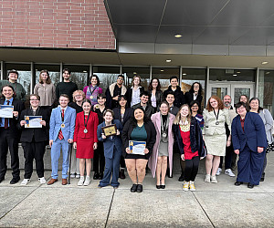 Members of the Lewis & Clark speech/debate team and coaching staff