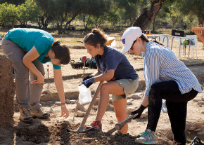 Students excavate bones, pottery, and other artifacts in the ancient ruins of Pollentia, a city f...