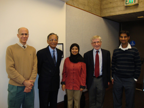 Dean Klonoff and Justice Ansari pose with students Saba and Manohar.