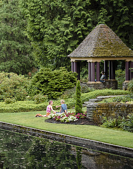 Students sitting in the estate gardens.