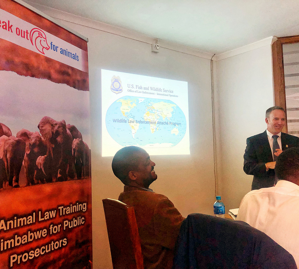 Ed Newcomer, Senior Special Agent, presenting on the USFWS' Wildlife Law Enforcement Attaché Program geared towards providing assistance...