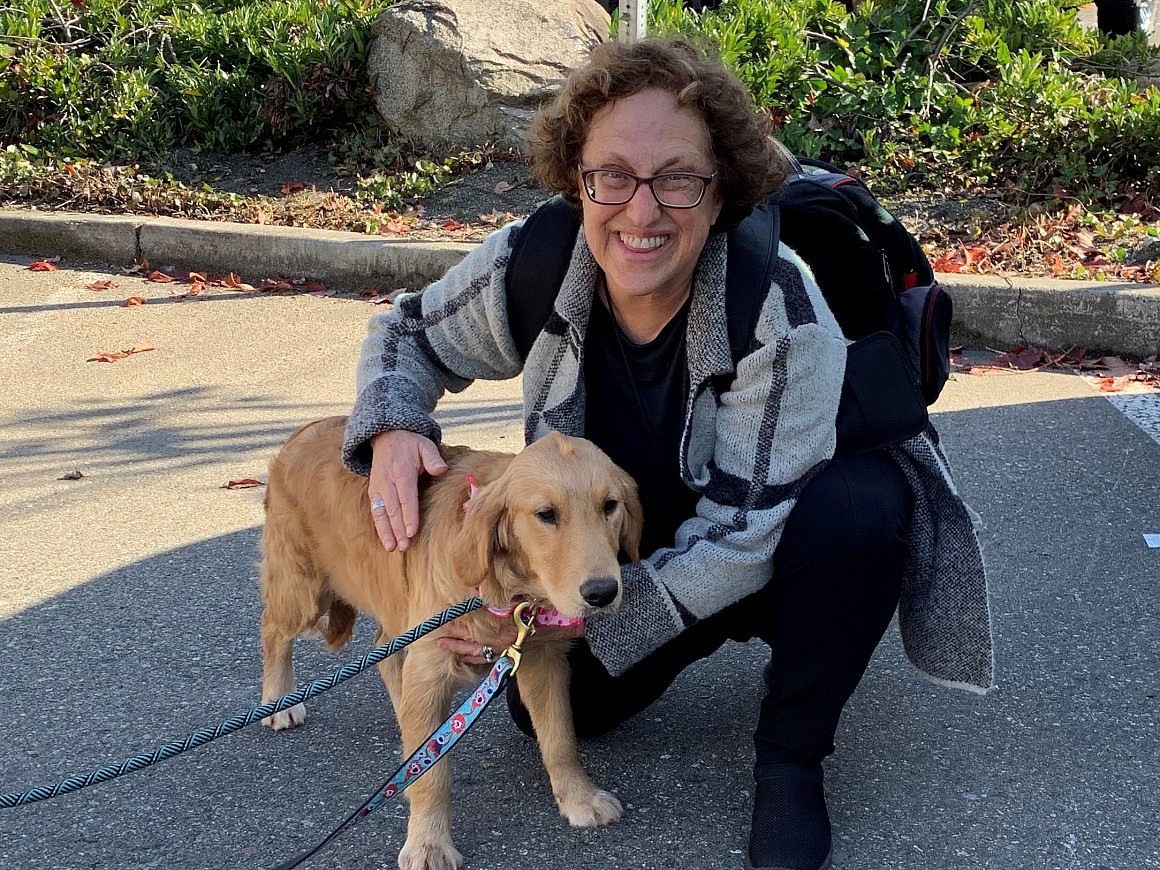 Professor Joyce Tischler with one of the dogs rescued in collaboration with Pacific Northwest rescue organization, Golden Bond Rescue, an...