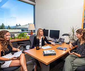 Students meeting with faculty 