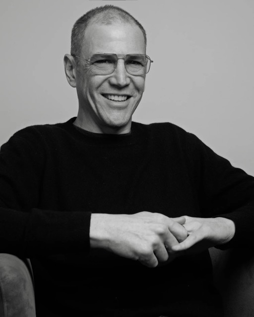 black and white headshot of Eric Rosenblum