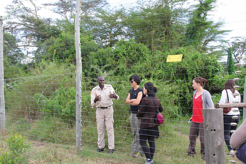 Students listen to a keeper at Sweetwaters Chimpanzee Sanctuary. The sanctuary began in 1993 to provide a permanent home to abused and or...