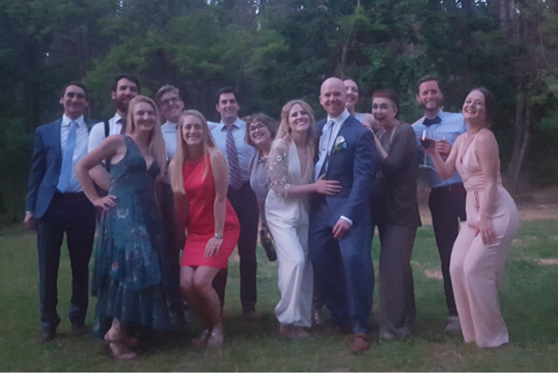 Rhylee Smith '14 and Jake Brooks'14 celebrate their wedding in thecompany of friends.