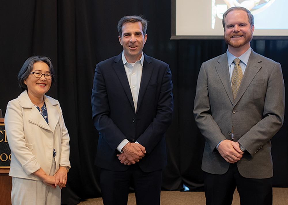 (L to R) Helen Kang joins award recipients Distinguished Graduate Gregory Adams '06 and Williamson Award Casey Bage '23.