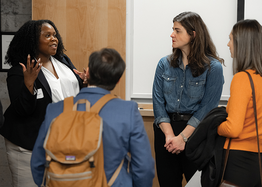 Speaker Brittani Gambrill shares insights with symposium participants.