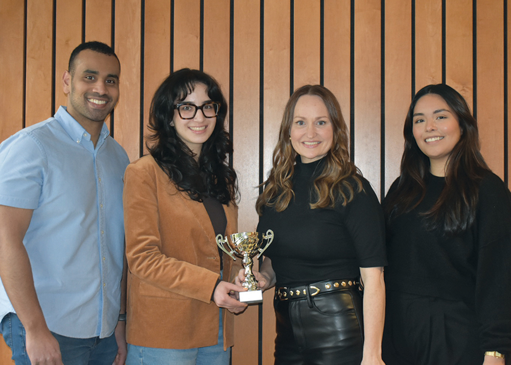 Syracuse Deposition Competition team: (L to R) Alpha Tessema '25, Lex Shvartsmann '25, and Krissi McVay '25 (formerly Farrimond), and The...