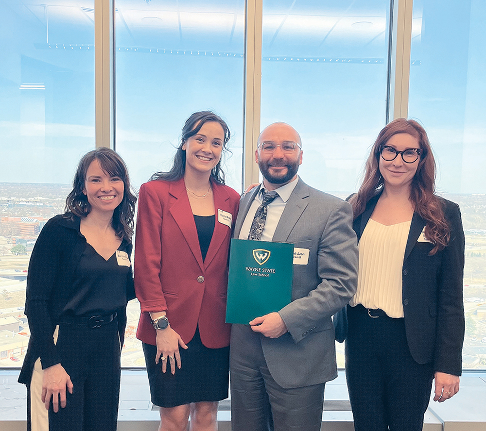 Wayne State Taft Transactional Law Invitational team: (L to R) Coach Bonnie Page, Hollis Robb '26, West Aron '25,and Brittany Mullen '26.
