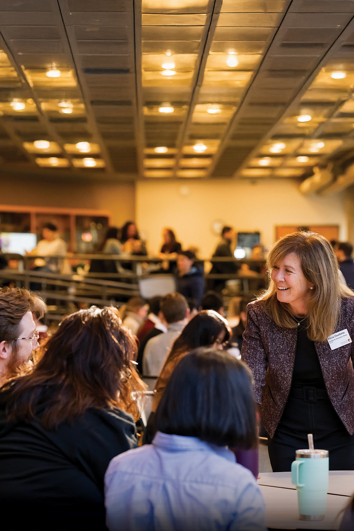 Dean Alicia Ouellette chats with law students.