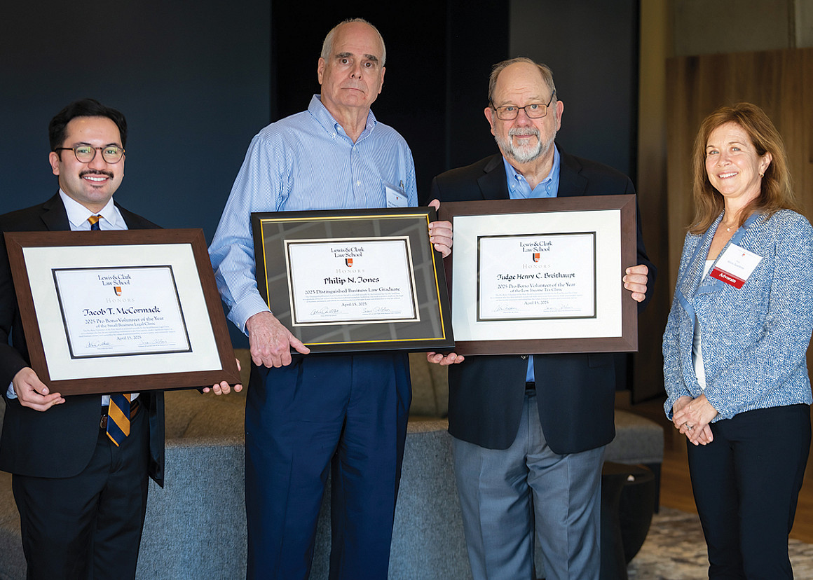 (L to R) Distinguished Business Law Graduate Jacob McCormack, Philip Jones,Judge Henry Breithaupt, and Dean Alicia Ouellette.