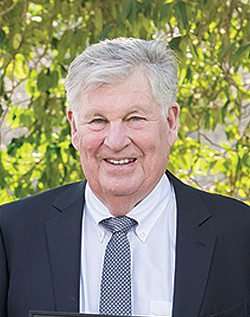 (L-R) Dean Johnson, Rex Malott '73, L '76, and Brad Krupicka '10.