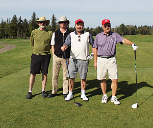 The winning team consisted of Vice President, Secretary, and  General Counsel David Ellis (left);  Don Thacker '85; Thomas Lombard '85;  ...