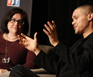 Linda Holmes '97 and Trevor Noah talk during NPR's Weekend in Washington event in 2015.