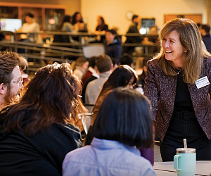 Dean Alicia Ouellette chats with law students.